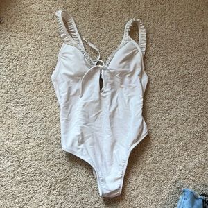 Strappy white one piece